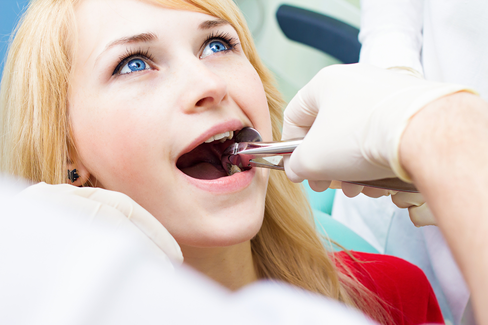 How tooth extraction process is done?